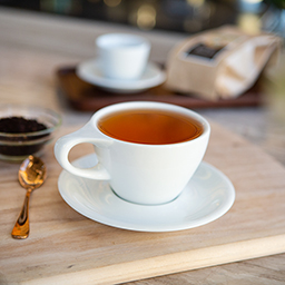 Toddy organic black tea in a teacup on counter